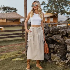 Full view of a long washed beige cargo denim skirt with drawstring waist detail.