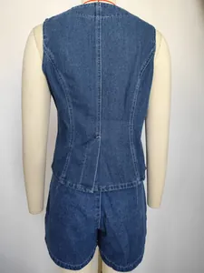 Detailed back view of casual sleeveless blue denim vest and matching shorts set on mannequin