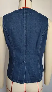 Detailed back view of a blue sleeveless denim vest with contrast white stitching