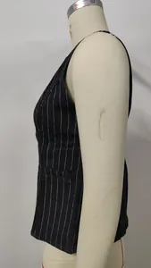 Side profile detail of a classic black pinstripe sleeveless denim vest on a mannequin