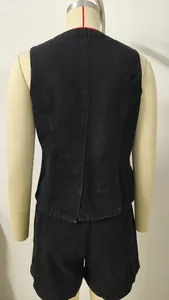 Detailed back view of a women's black washed denim sleeveless vest and matching shorts