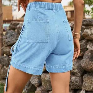 Back view detail of light blue denim cargo shorts featuring elastic waist and pockets