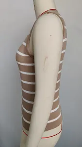 Side view detail showing the ribbed texture of a khaki and white striped tank top