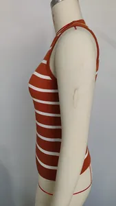 Detailed side view of vintage orange and white striped slim fit knitted tank top