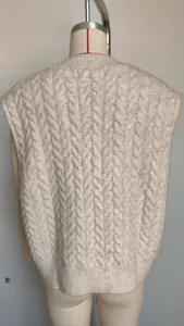 Detailed back view of a stylish vintage beige cable-knit sleeveless pullover sweater vest