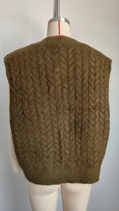 Back view of retro cable knit sweater vest in moss green on a sewing mannequin