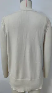 Detail back view of a minimalist women's solid color cream knit sweater vest on display