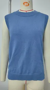 Front detailed view of a casual light blue sleeveless knitted sweater vest for women