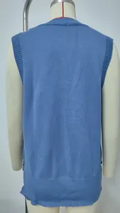 Detailed rear view of light blue knitted sweater vest on a mannequin showing texture