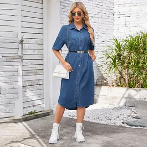 Fashionable washed blue denim short sleeve shirt dress with button-down front and belt.