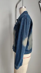 Detailed side view of a classic washed blue denim jacket for women casual outerwear