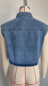 Detailed back view of a stylish cropped blue denim sleeveless vest on a mannequin