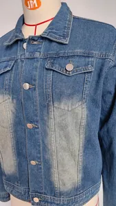 Detailed view of women's vintage washed blue denim jacket on mannequin