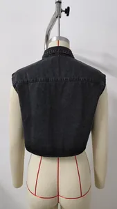 Back view of a women's washed charcoal denim cropped vest shown on a mannequin stand