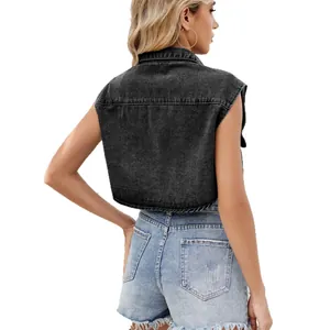 Back view of a trendy women's washed black cropped denim vest with frayed shorts
