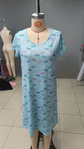 Light blue short sleeve nightgown featuring a butterfly and polka dot print on a mannequin