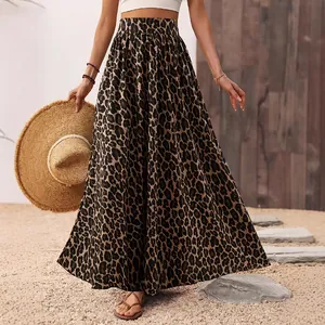 Chic leopard print maxi skirt for women featuring high waist and flowy silhouette