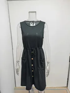 Detailed view of a black sleeveless summer dress featuring a drawstring waist and wooden buttons