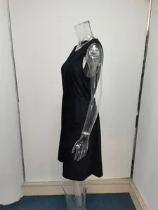 Side view of a black sleeveless loose-fit dress presented on a transparent mannequin.
