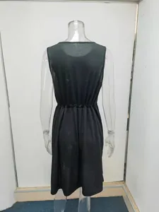 Detailed back view of a black sleeveless tank dress with an elastic waist design