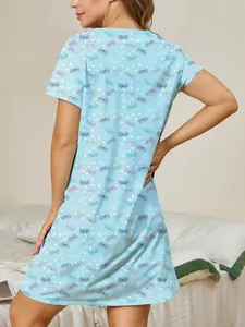 Detailed back view of a light blue short sleeve nightgown with colorful dragonfly print