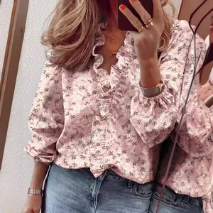 Elegant pink floral long sleeve blouse with feminine ruffle V-neck and elastic cuffs