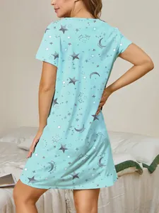 Back view of a light blue nightgown featuring moon and star prints with text detail.