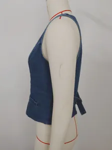 Detailed side view of washed blue denim vest on mannequin highlighting pocket design