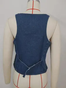 Detailed rear view of a women's washed denim vest with an adjustable back buckle