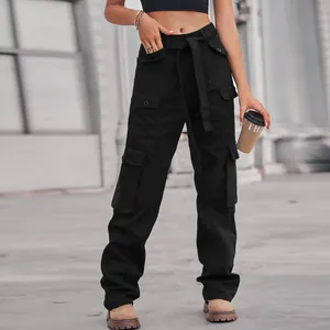 Detail of black multi-pocket cargo pants featuring high waist and belted utility design.