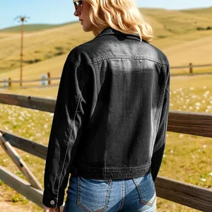 Back view of a relaxed-fit black distressed denim jacket with drop-shoulder detail