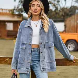 Outdoor lifestyle shot of a retro loose denim jacket for women featuring classic pockets
