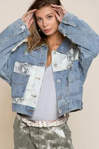 Stylish women's blue denim jacket with snakeskin print panel and distressed details