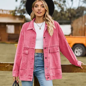 Detailed view of the pink retro loose denim jacket worn in an outdoor setting