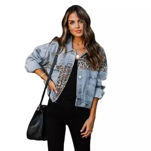 Stylish women's blue denim jacket featuring trendy leopard print patchwork and ripped details
