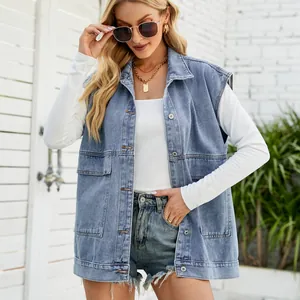 Close-up detail of women's vintage blue wash denim vest featuring functional pockets