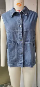 Detailed front view of a casual women's loose blue denim vest on a mannequin stand