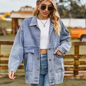 Stylish oversized light wash denim jacket for women, perfect for retro casual outfits.
