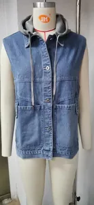 Close-up detail view of a blue loose denim hooded vest with a grey hood on a mannequin