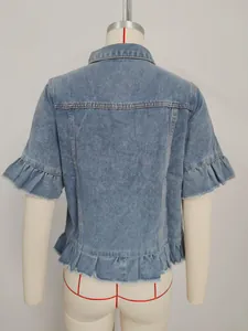 Back view of washed light blue denim short sleeve jacket with ruffle hem detail
