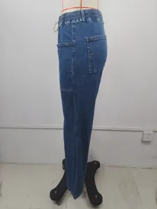 Side view of blue drawstring denim pants displayed on a mannequin torso