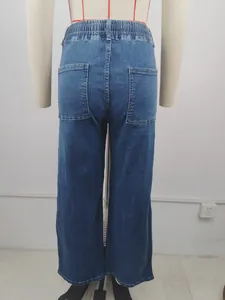 Back view of high waisted elastic blue denim jeans with large pockets for women
