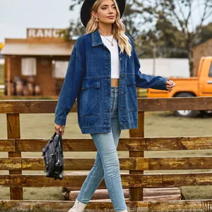 Side view of a vintage oversized dark blue denim jacket with large front pockets.