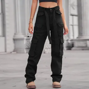 Close-up detail of women's black washed denim cargo pants featuring multiple utility pockets