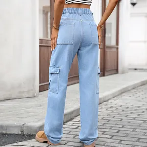 Back view of light blue denim cargo pants with high elastic waist for women.
