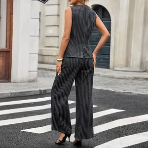 Back view of chic pinstripe sleeveless denim vest and wide-leg trouser set for women.