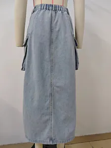 Back view of light blue denim cargo maxi skirt featuring elastic waist and pockets