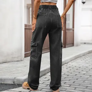 Back view of women's black washed cargo jeans with elastic waist and flap pockets.