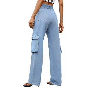 Women's light blue washed denim cargo pants with multi-pockets and wide leg
