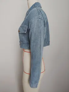 Detailed side view of a vintage light blue cropped denim jacket on a mannequin